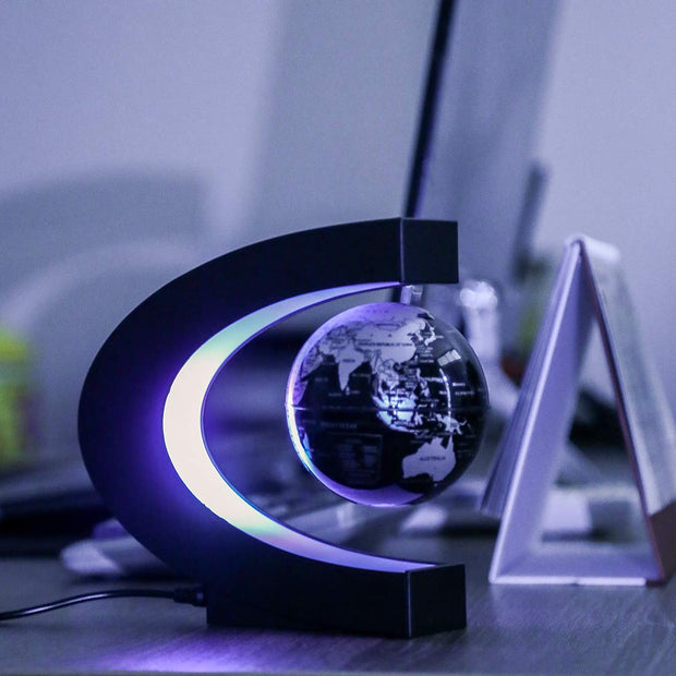 LED floating globe displayed on office desk